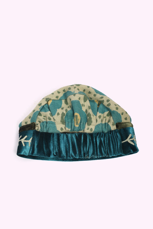 Hat in printed cashmere cotton blend with elastic back