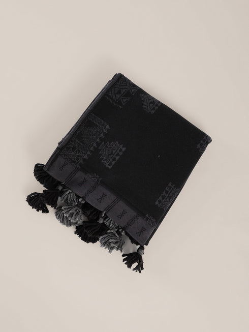 Scarf in patterned jacquard with tassels