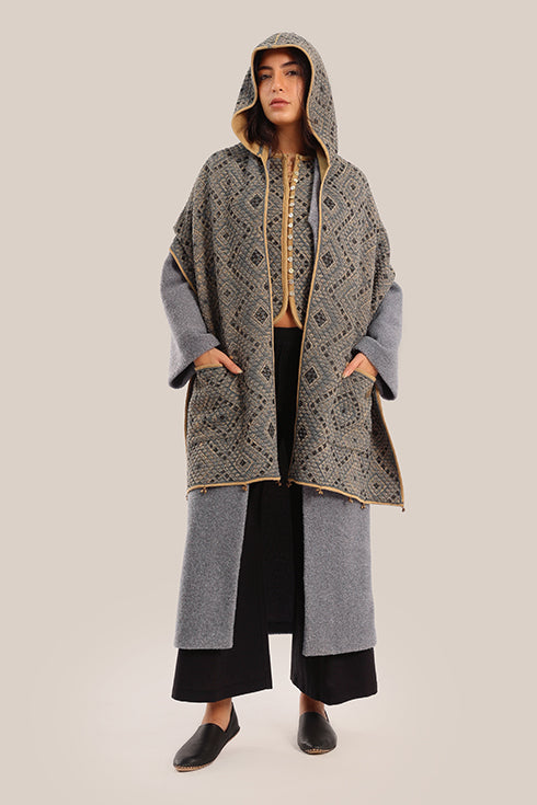 Hooded shawl with pockets and tassels