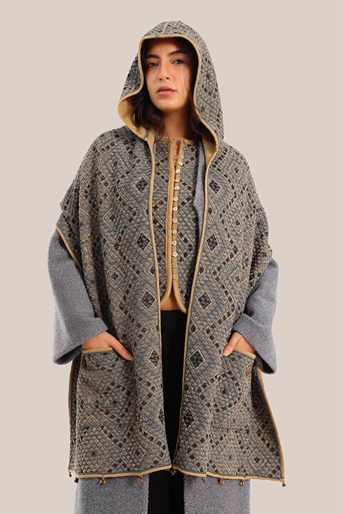 Hooded shawl with pockets and tassels