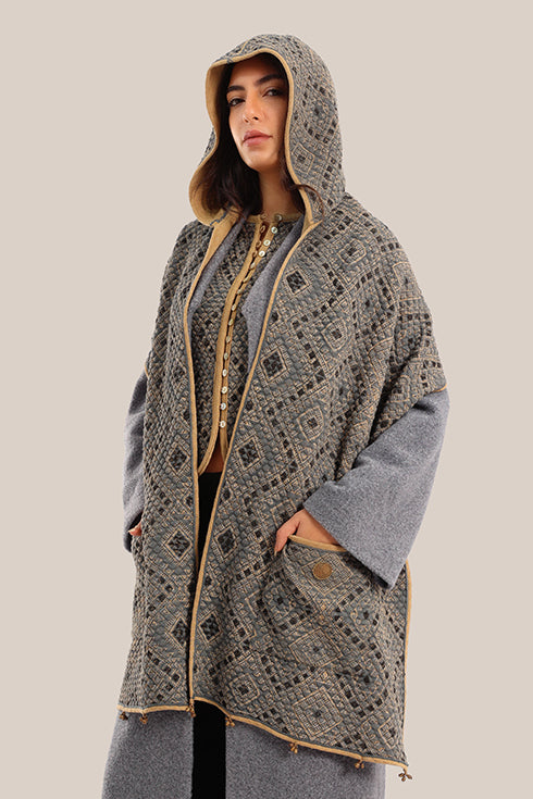 Hooded shawl with pockets and tassels