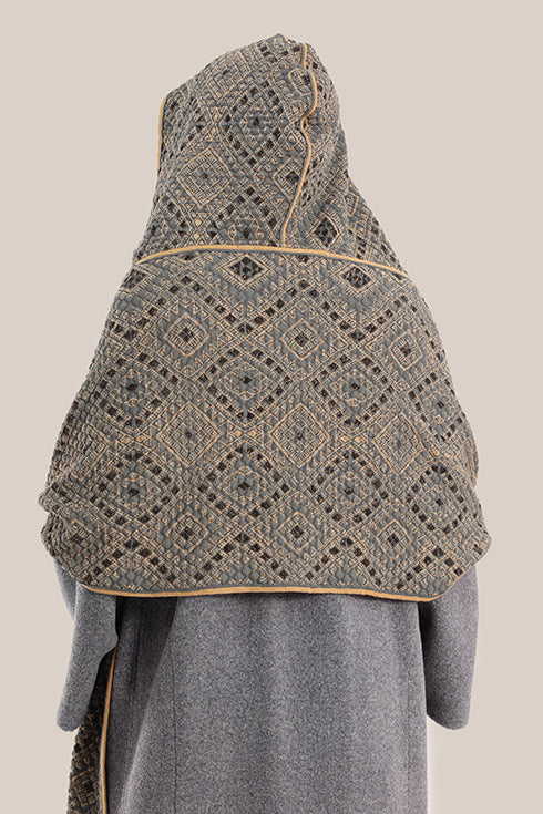Hooded shawl with pockets and tassels