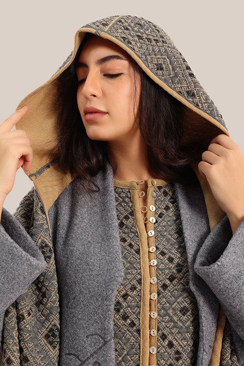Hooded shawl with pockets and tassels