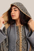 Hooded shawl with pockets and tassels