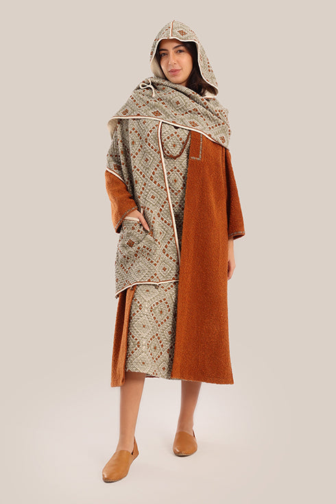 Hooded shawl with pockets and tassels