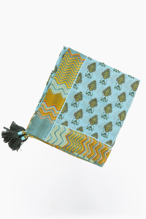Scarf in printed cotton gauze with tassels and trimmed border