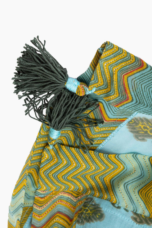 Scarf in printed cotton gauze with tassels and trimmed border