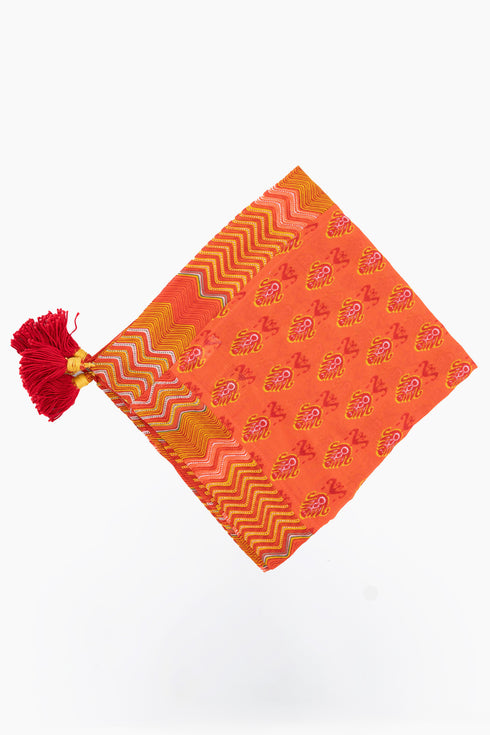 Scarf in printed cotton gauze with tassels and trimmed border