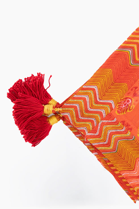 Scarf in printed cotton gauze with tassels and trimmed border