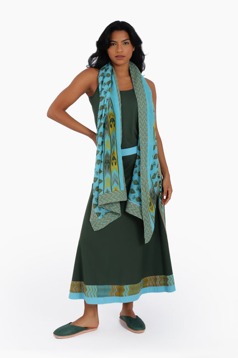 Scarf trimmed in contrast print cotton gauze.