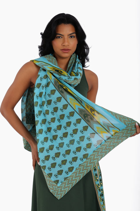 Scarf trimmed in contrast print cotton gauze.
