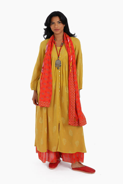 Scarf trimmed in contrast print cotton gauze.