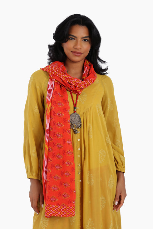 Scarf trimmed in contrast print cotton gauze.