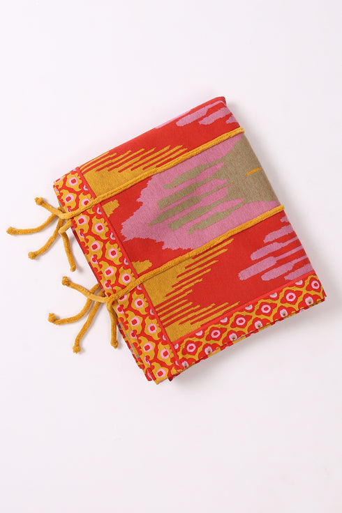 Shawl in patterned jacquard with tassels