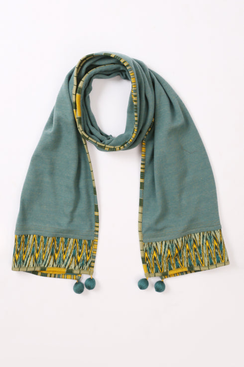 Shawl in plain cotton blend jacquard with pom poms