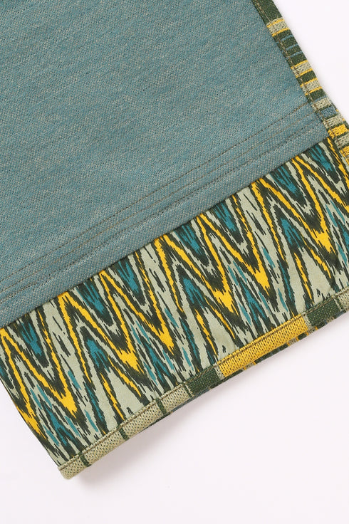 Shawl in plain cotton blend jacquard with pom poms