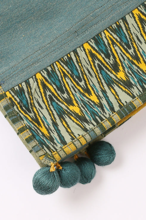 Shawl in plain cotton blend jacquard with pom poms