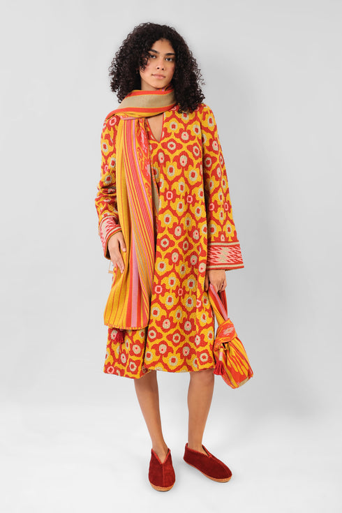 Shawl in striped jacquard cotton with tassels