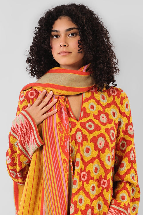 Shawl in striped jacquard cotton with tassels