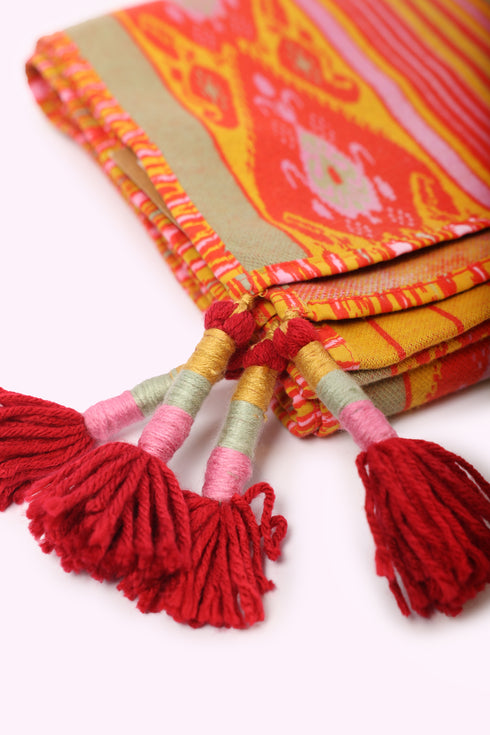 Shawl in striped jacquard cotton with tassels