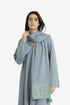 Embroidered jacquard shawl with pompom detailing