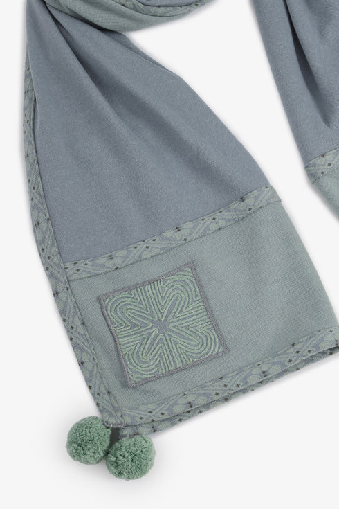 Embroidered jacquard shawl with pompom detailing