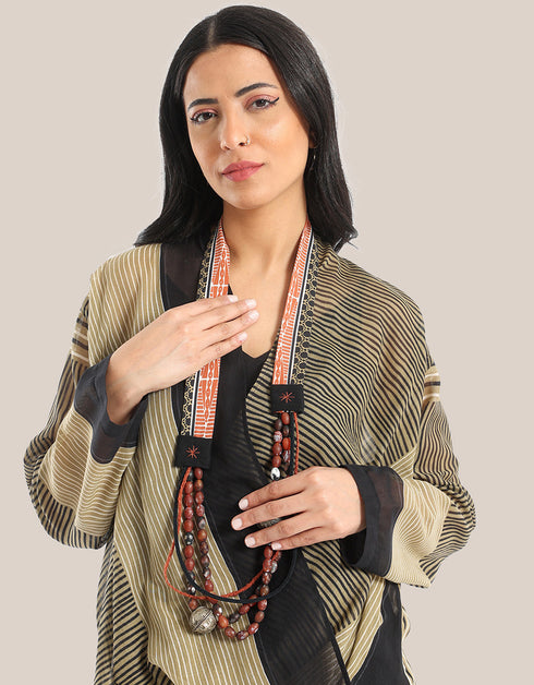 long necklace with braided linen yarn and antique bedouin silver beads