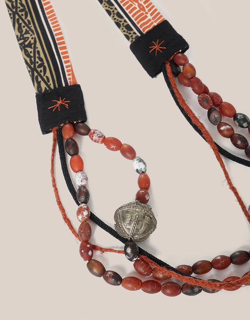 long necklace with braided linen yarn and antique bedouin silver beads
