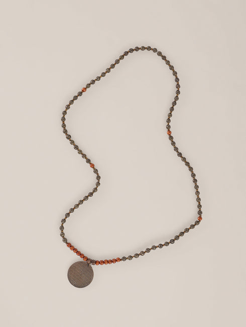 Long necklace from wood and metal