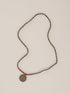 Long necklace from wood and metal