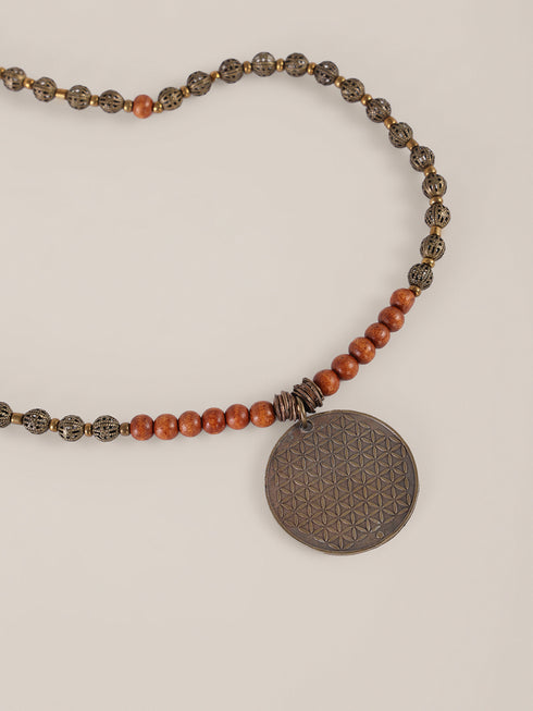 Long necklace from wood and metal