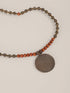 Long necklace from wood and metal