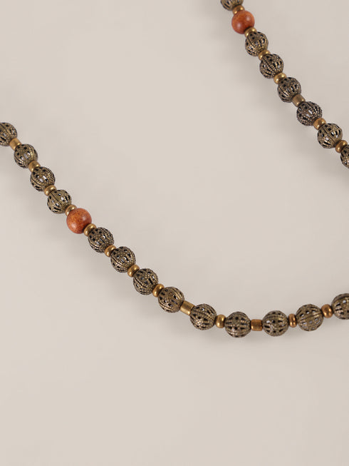 Long necklace from wood and metal
