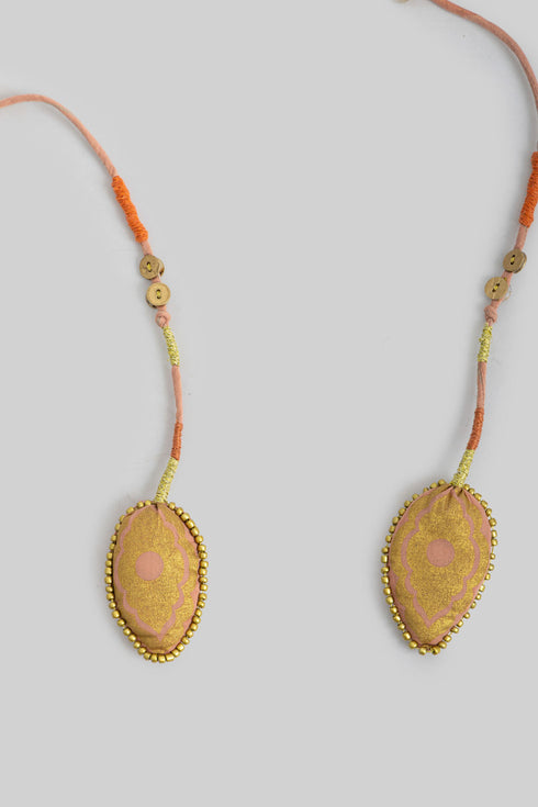 Handmade necklace embellished with beads and buttons