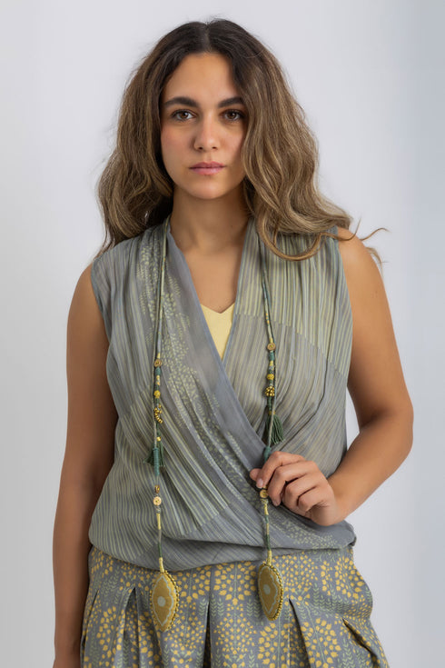 Handmade necklace embellished with beads and buttons