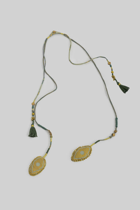 Handmade necklace embellished with beads and buttons