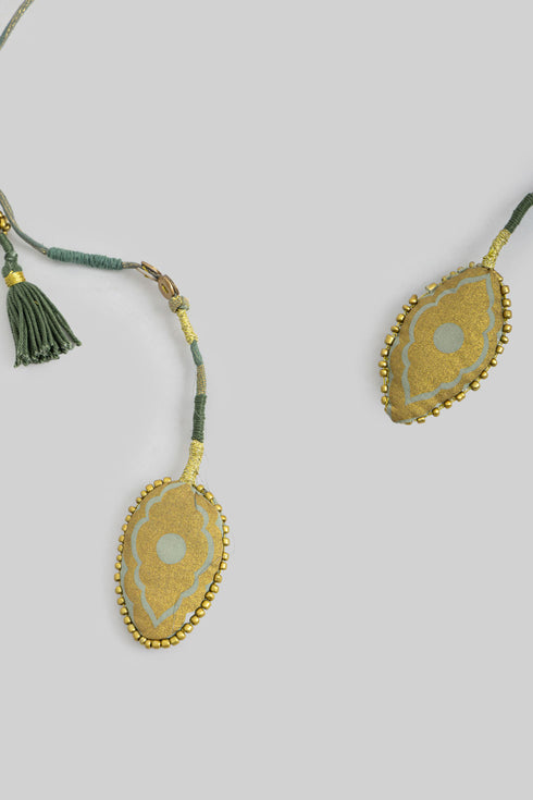 Handmade necklace embellished with beads and buttons