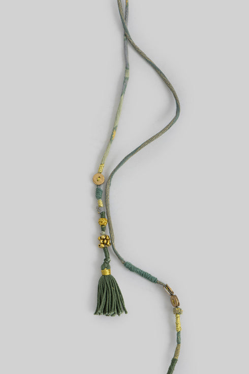 Handmade necklace embellished with beads and buttons