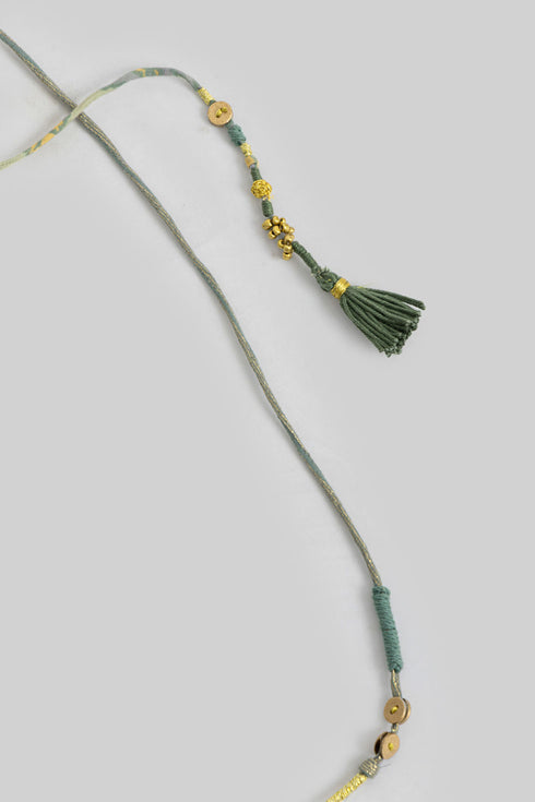 Handmade necklace embellished with beads and buttons