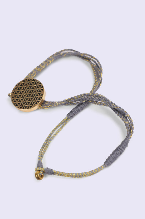 Short braided yarn pendant necklace