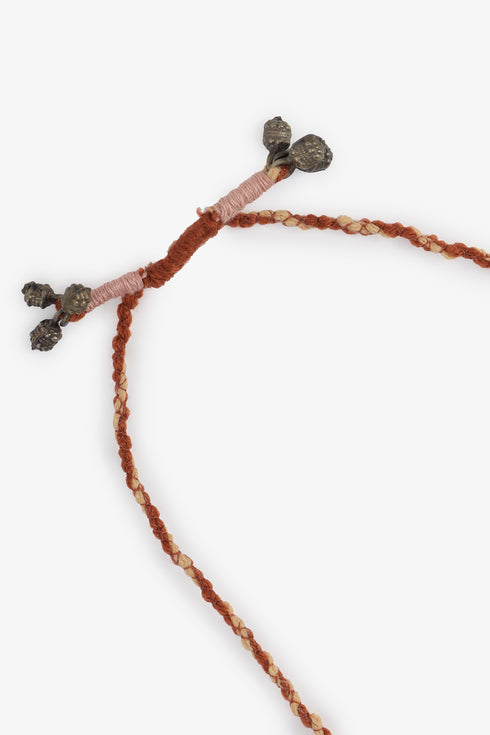 Adjustable fabric ball necklace with metal tassels