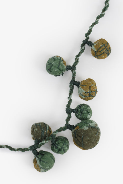 Adjustable fabric ball necklace with metal tassels