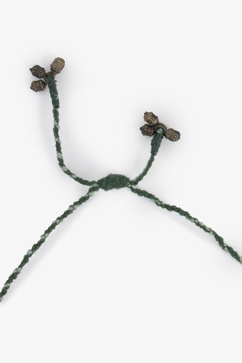 Adjustable fabric ball necklace with metal tassels