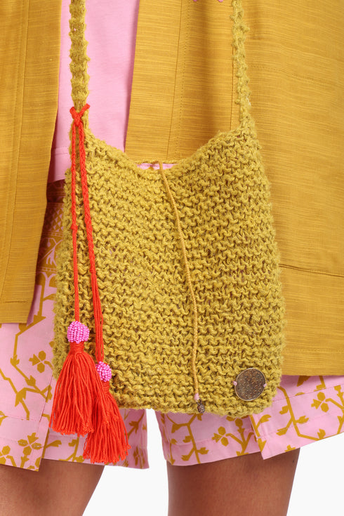 Hand knitted cross body bag in linen yarn