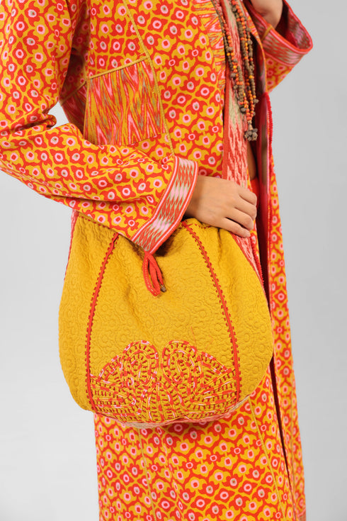 Hand embroidered bag in quilted cotton blend