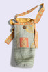 Patchwork long cylinder crossbody bag