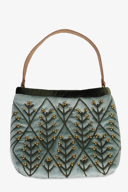 Embroidered velvet bag with genuine leather strap
