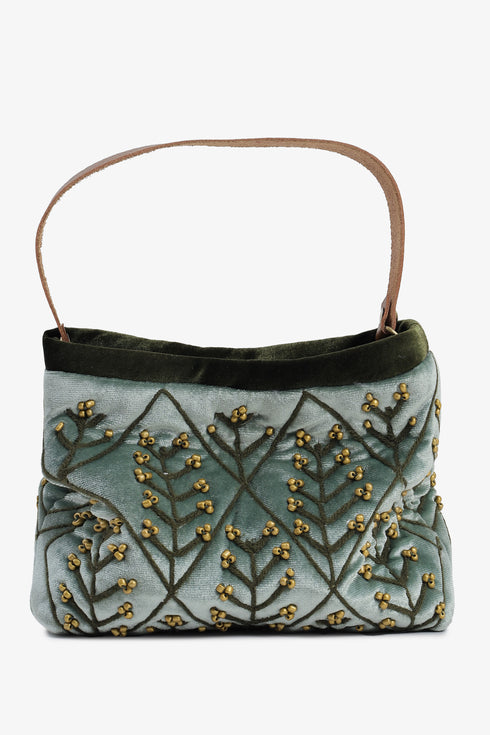 Embroidered velvet bag with genuine leather strap