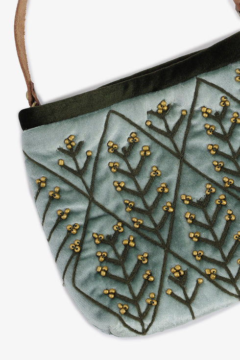 Embroidered velvet bag with genuine leather strap