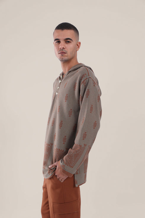 Hooded sweater with part front buttons